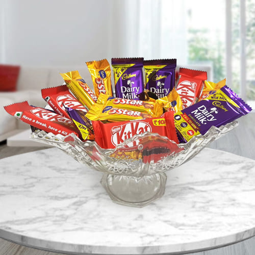 Yummy Mixed Chocolate Assortments in Glass Fruit Vase Yummy Mixed Chocolate Assortments in Glass Fruit Vase