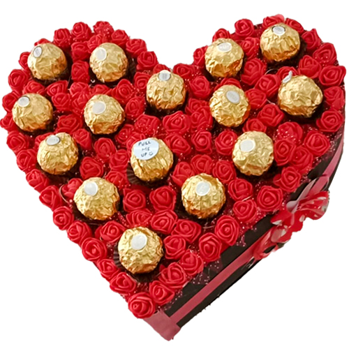 Delightful Heart Arrangement of Sapphire Hazelfills Chocolates on Roses
