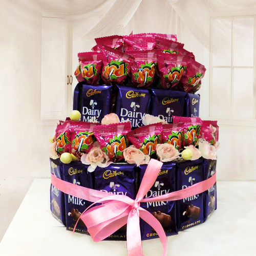 Arrangement of Cadbury Dairy Milk with Lollipops Arrangement of Cadbury Dairy Milk with Lollipops