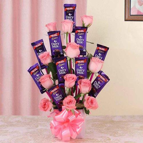 Wonderful Arrangement of Roses with Cadbury Dairy Milk Chocolates