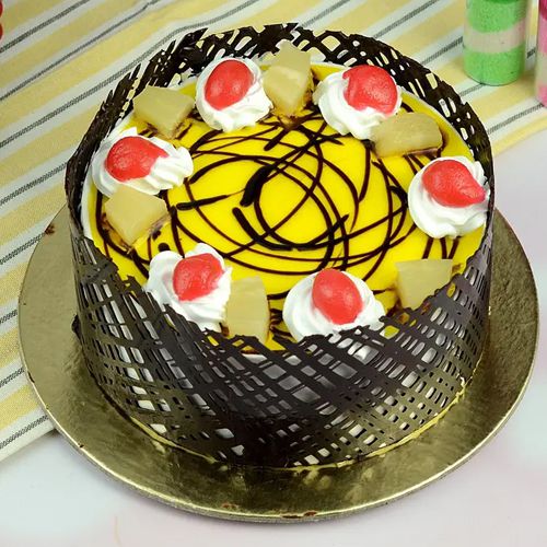 Enjoyable Eggless Pineapple Cake in Round Shape