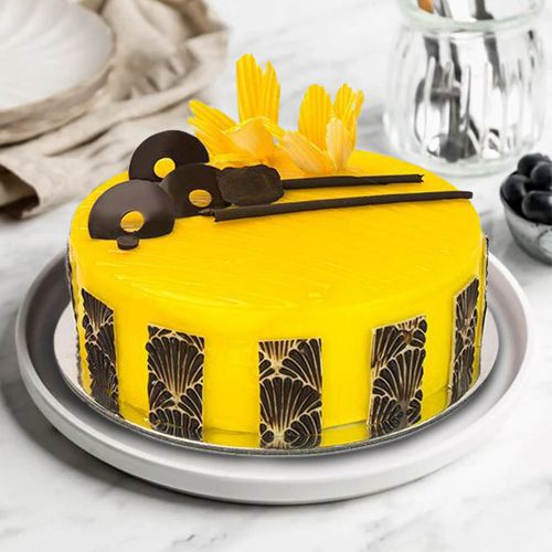 Marvelous Eggless Mango Cake with Chocolates Thins