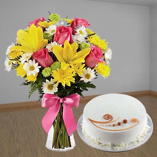 Delicious Vanilla Cake with Mixed Flowers Delicious Vanilla Cake with Mixed Flowers