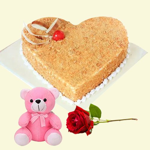 Delicious Heart Shaped Butter Scotch Cake with Single Rose and Teddy Delicious Heart Shaped Butter Scotch Cake with Single Rose and Teddy