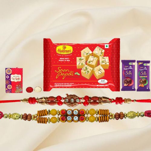Exquisite Festive Favorite Sweets N Chocolate Gift Hamper with Two Rakhis With Free Rakhi Card and Roli Tilak Chawal Exquisite Festive Favorite Sweets N Chocolate Gift Hamper with Two Rakhis With Free Rakhi Card and Roli Tilak Chawal