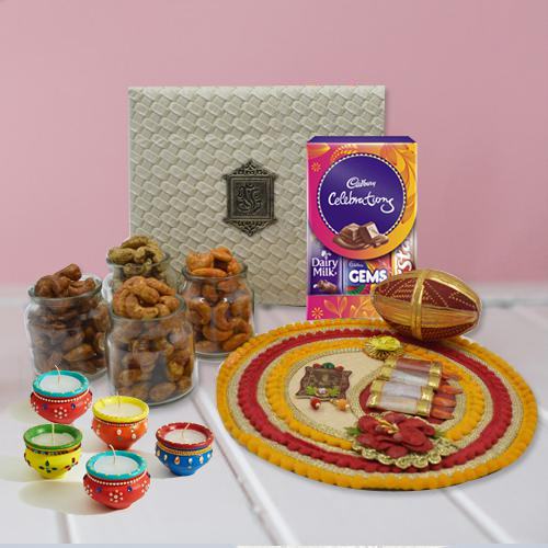 Decorative Thali with Flavored Cashew Cadbury Chocolates n Diya