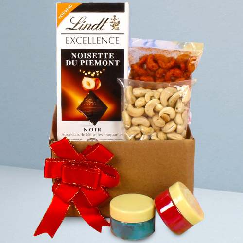 Delightful Box of Lindt Chocolates with Masala Nuts n Free Herbal Gulal