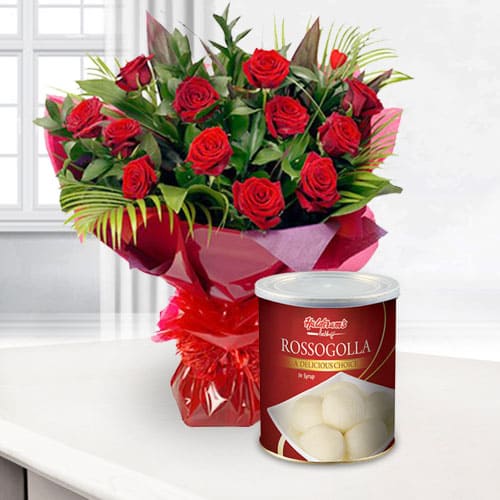 Mesmerizing Bouquet of Red Roses with Haldiram Rasgulla Mesmerizing Bouquet of Red Roses with Haldiram Rasgulla