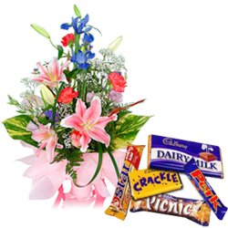 Stunning Assorted Flowers Arrangement with Assorted Cadbury Chocolates Stunning Assorted Flowers Arrangement with Assorted Cadbury Chocolates