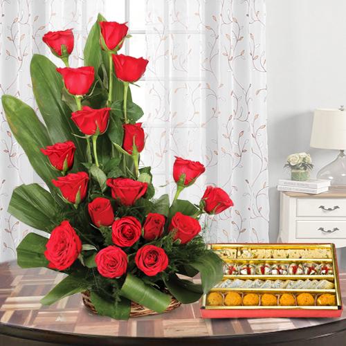 Red Roses Arrangement with Haldirams Mixed Sweets Red Roses Arrangement with Haldirams Mixed Sweets