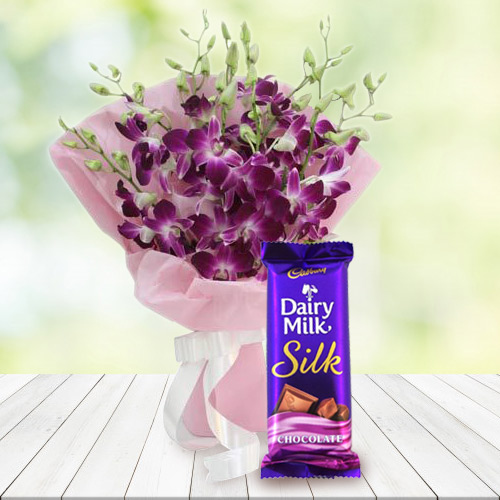 Gorgeous Bouquet of Orchids with Cadbury Dairy Milk Silk Gorgeous Bouquet of Orchids with Cadbury Dairy Milk Silk