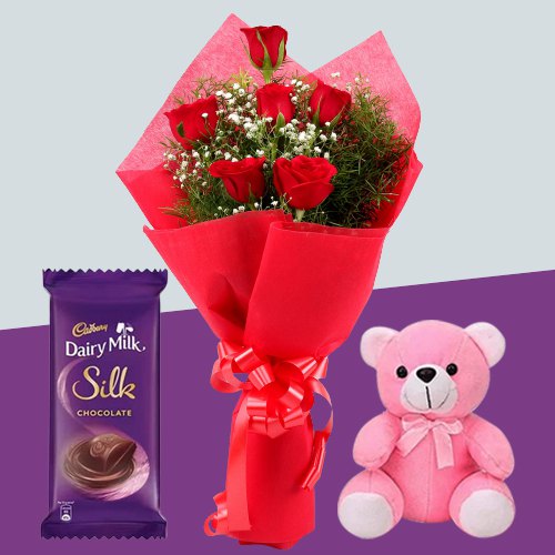 Delightful Red Roses Bouquet with Teddy N Cadbury Dairy Milk Silk Delightful Red Roses Bouquet with Teddy N Cadbury Dairy Milk Silk