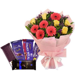 Mesmerizing Bouquet of Mixed Flowers with Assorted Cadbury Chocolates Mesmerizing Bouquet of Mixed Flowers with Assorted Cadbury Chocolates