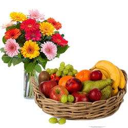 Bunch of Mixed Gerberas in a Vase with Fresh Fruits Basket