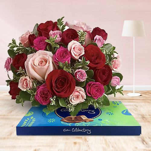 Visually 50 Pink and Red Roses Assortment with Cadburys Chocs Pleasure Visually 50 Pink and Red Roses Assortment with Cadburys Chocs Pleasure