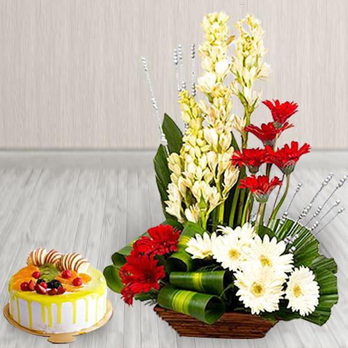 Captivating Combo of Fresh Flowers Arrangement with Mango Flavor Cake Captivating Combo of Fresh Flowers Arrangement with Mango Flavor Cake
