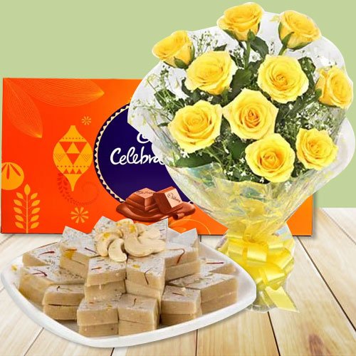 12 Yellow Roses with Cadbury Celebration and Kaju Katli 12 Yellow Roses with Cadbury Celebration and Kaju Katli