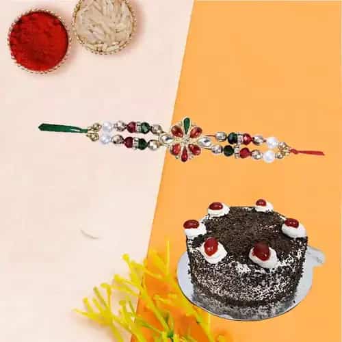 Mouth-Watering Black Forest Cake along with Rakhi and Free Roli Tika N Chawal for your Caring Brother