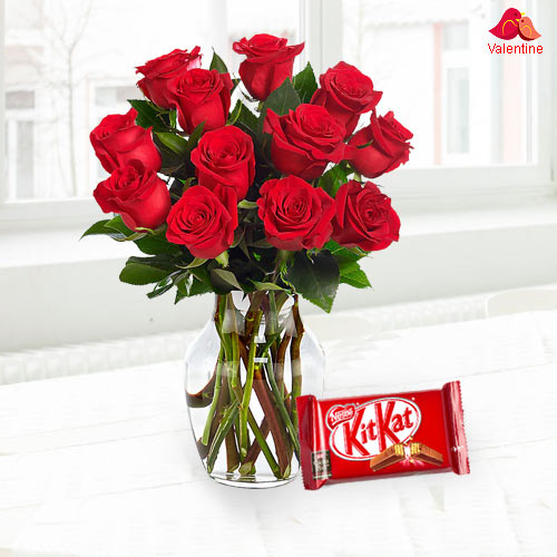Exclusive Dutch Red Roses in Vase with free Cadburys Chocolate Exclusive Dutch Red Roses in Vase with free Cadburys Chocolate