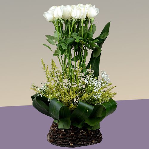 Elegant Tall Arrangement of White Roses in a Basket Elegant Tall Arrangement of White Roses in a Basket