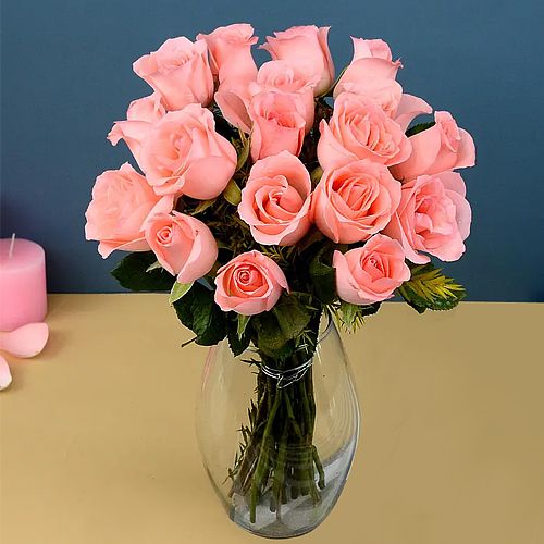 Fresh Pink Roses in a Glass Vase
