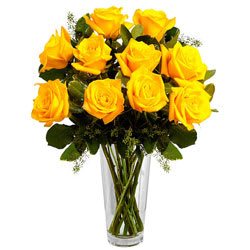 Pretty Arrangement of Yellow Roses in a Vase Pretty Arrangement of Yellow Roses in a Vase