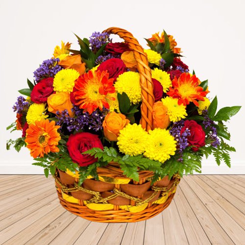 Display of Seasonal Flowers in a Basket Display of Seasonal Flowers in a Basket