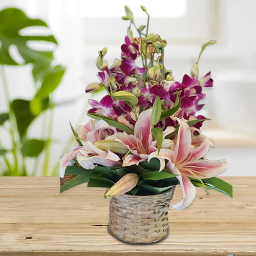 Lovely Pink Oriental Lilies n Purple Orchids Arrangement Lovely Pink Oriental Lilies n Purple Orchids Arrangement