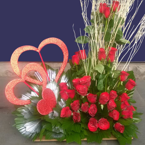 Charismatic Arrangement of Red Roses with Triple Heart
