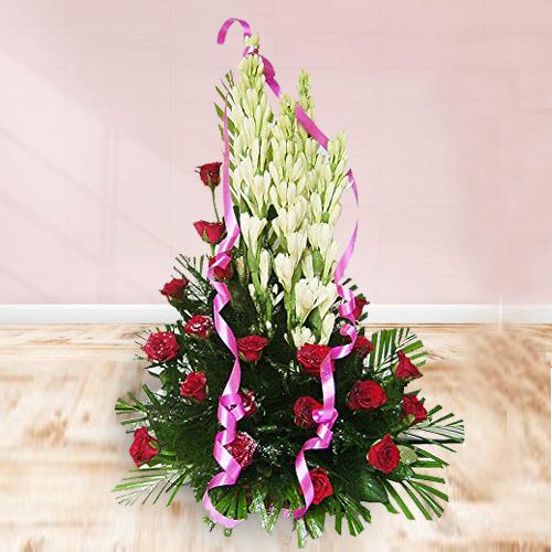 Brilliant Hand Arrangement of White Rajnigandha n Red Roses Brilliant Hand Arrangement of White Rajnigandha n Red Roses