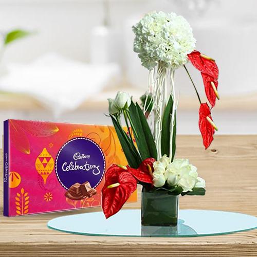 Beautiful Flowers Arrangement in Glass Vase with Cadbury Celebration Beautiful Flowers Arrangement in Glass Vase with Cadbury Celebration