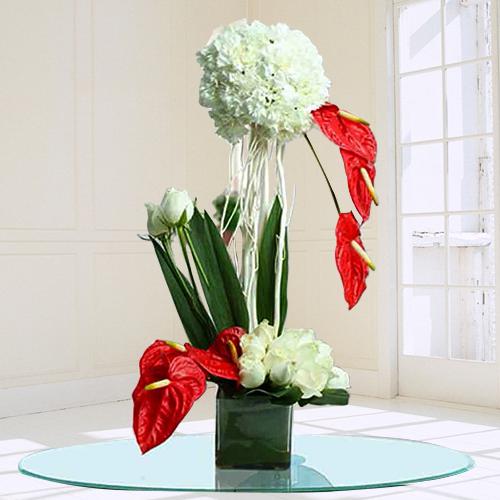 Remarkable Assorted Flowers Arrangement in Glass Vase Remarkable Assorted Flowers Arrangement in Glass Vase
