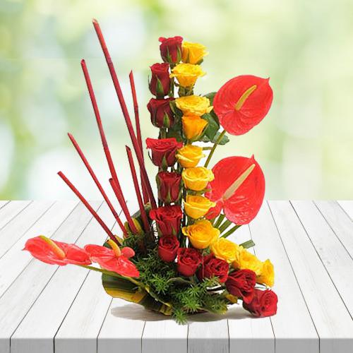 Exquisite Arrangement of Red N Yellow Roses with Anthurium Exquisite Arrangement of Red N Yellow Roses with Anthurium