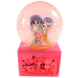 Magnificent Love Couple in LED Lighted Glass Globe with Floating Tinsel