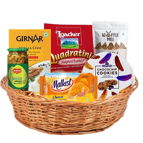 Remarkable Tea with Assorted Crunchies N Olives Gift Basket