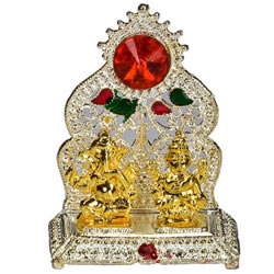 Silver Plated mandap with Golden Ganesh Laxmi Idol Silver Plated mandap with Golden Ganesh Laxmi Idol