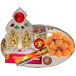 Exquisite Ganesh Lakshmi Idols with Silver Plated Thali and Pure Ghee Ladoo Exquisite Ganesh Lakshmi Idols with Silver Plated Thali and Pure Ghee Ladoo