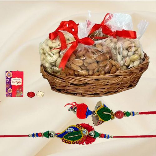 Enticing Gift of Bhaiya Bhabhi Rakhi with Exotic Dry Fruits Basket