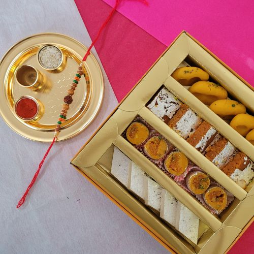 Attractive Rudraksha Rakhi with Sweets  N  Golden Rakhi Thali Combo