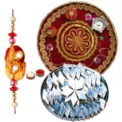 Trendsetting Selection of Haldirams Kaju Katli and Pooja Thali with Rakhi Roli Tilak and Chawal Trendsetting Selection of Haldirams Kaju Katli and Pooja Thali with Rakhi Roli Tilak and Chawal