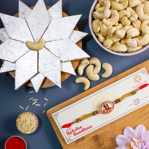Stylish Ganesha Rakhi with Nuts N Sweets Delight Stylish Ganesha Rakhi with Nuts N Sweets Delight
