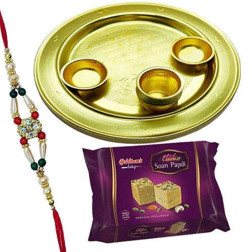 Delightful Selection of Soan Papri from Haldiram and Silver Plated Thali with free Rakhi Roli Tilak and Chawal for Special Rakhi Festival