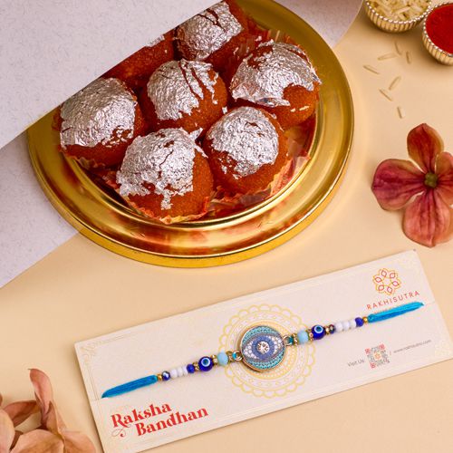 Fancy Evil Eye Rakhi N Ghee Laddu Combo Fancy Evil Eye Rakhi N Ghee Laddu Combo