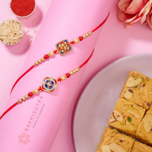 Elegant Kundan Rakhi Pair with Sweet Soan Papdi Elegant Kundan Rakhi Pair with Sweet Soan Papdi