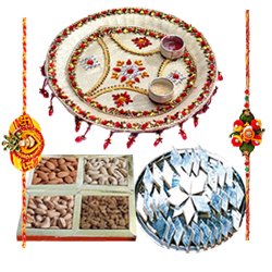 Enticing Rakhi Special Gift of Pooja Thali Dry Fruits and Delicious Kaju Katli with 2 Free Rakhi Roli Tika and Chawal Enticing Rakhi Special Gift of Pooja Thali Dry Fruits and Delicious Kaju Katli with 2 Free Rakhi Roli Tika and Chawal