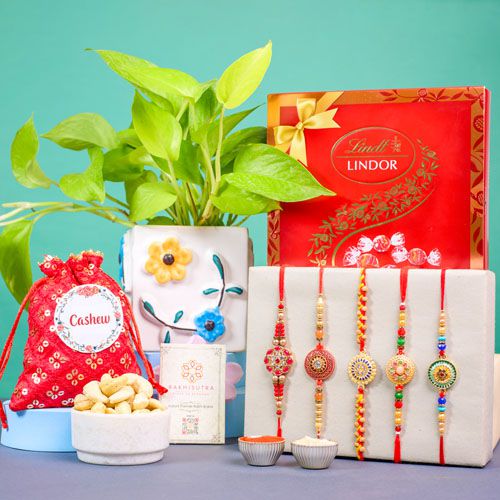 Delightful Rakhi Gift Ensemble with Lindt N Golden Pothos Delightful Rakhi Gift Ensemble with Lindt N Golden Pothos