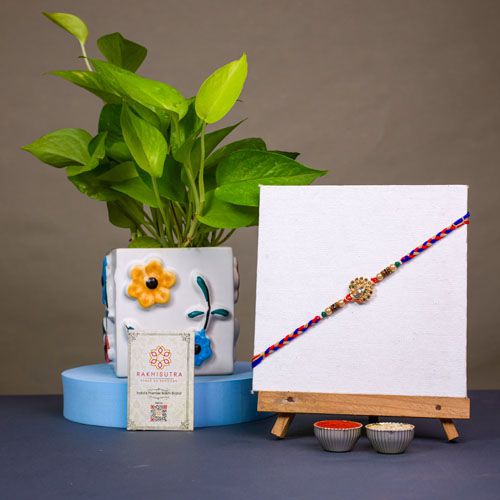 Kundan Rakhi N Golden Pothos Combo Kundan Rakhi N Golden Pothos Combo