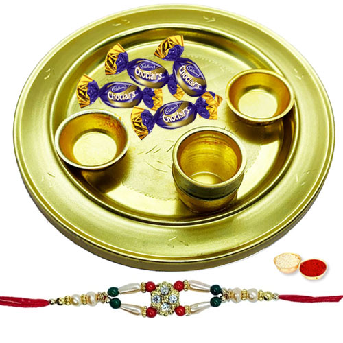 Enticing 4 Eclairs Chocolates and Silver Plated Thali with a Free Rakhi Roli Tilak and Chawal for your Precious Brother on the Occasion of Rakhi Enticing 4 Eclairs Chocolates and Silver Plated Thali with a Free Rakhi Roli Tilak and Chawal for your Precious Brother on the Occasion of Rakhi
