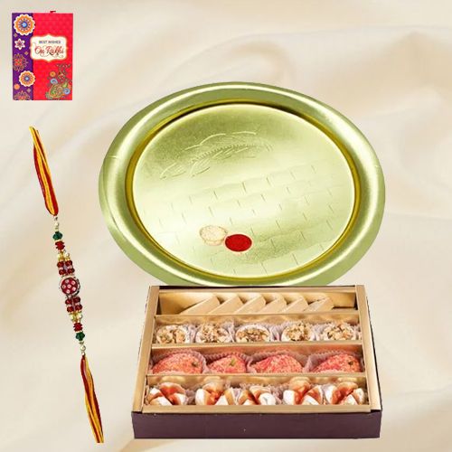 Graceful Gift of Gold Plated Puja Thali and Assorted Sweets from Haldiram with Free Rakhi Roli Tilak and Chawal for your Lovely Siblings Graceful Gift of Gold Plated Puja Thali and Assorted Sweets from Haldiram with Free Rakhi Roli Tilak and Chawal for your Lovely Siblings