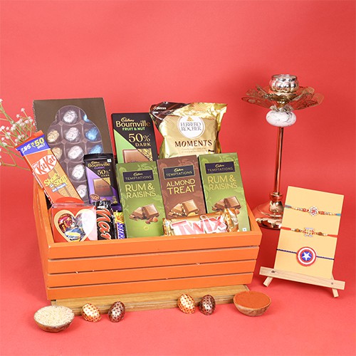Divine Swastik Rakhi & Chocolates Hamper Divine Swastik Rakhi & Chocolates Hamper